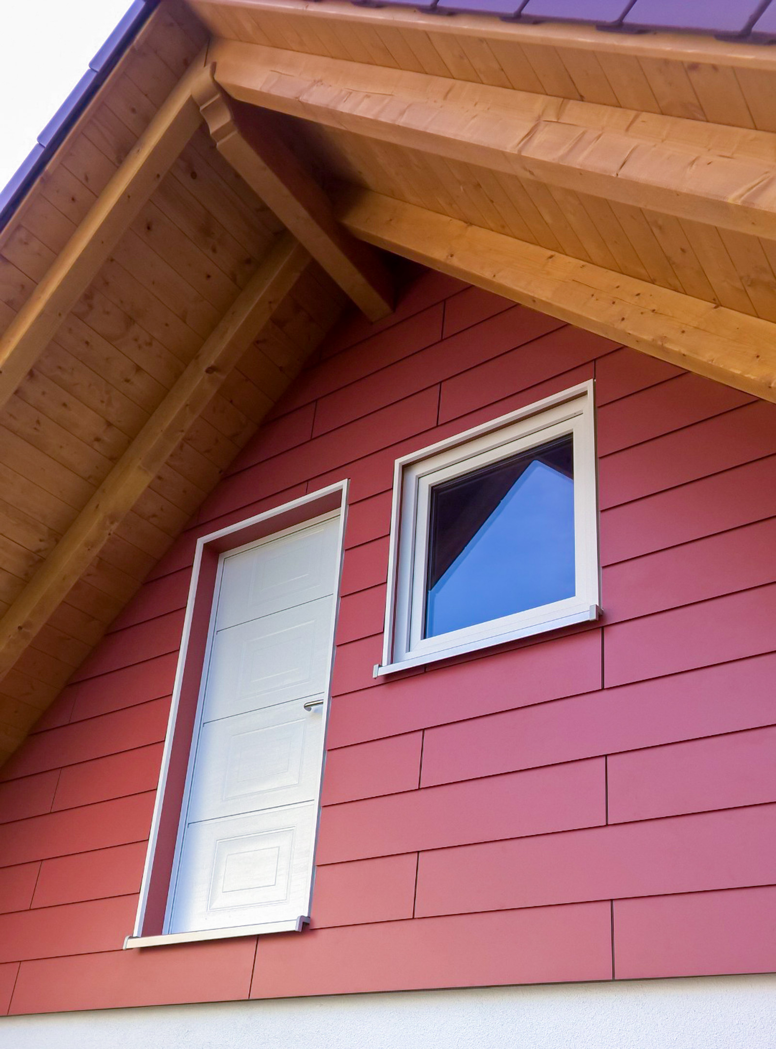 Erkerverkleidung mit Fundermax Exterior 0793 Patina Zinn Stulpschalung