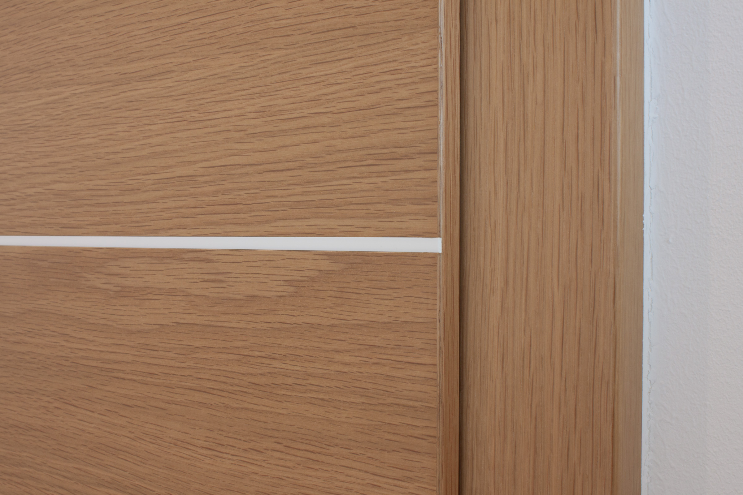 Zimmertür Eiche furniert mit weißen Lisenen