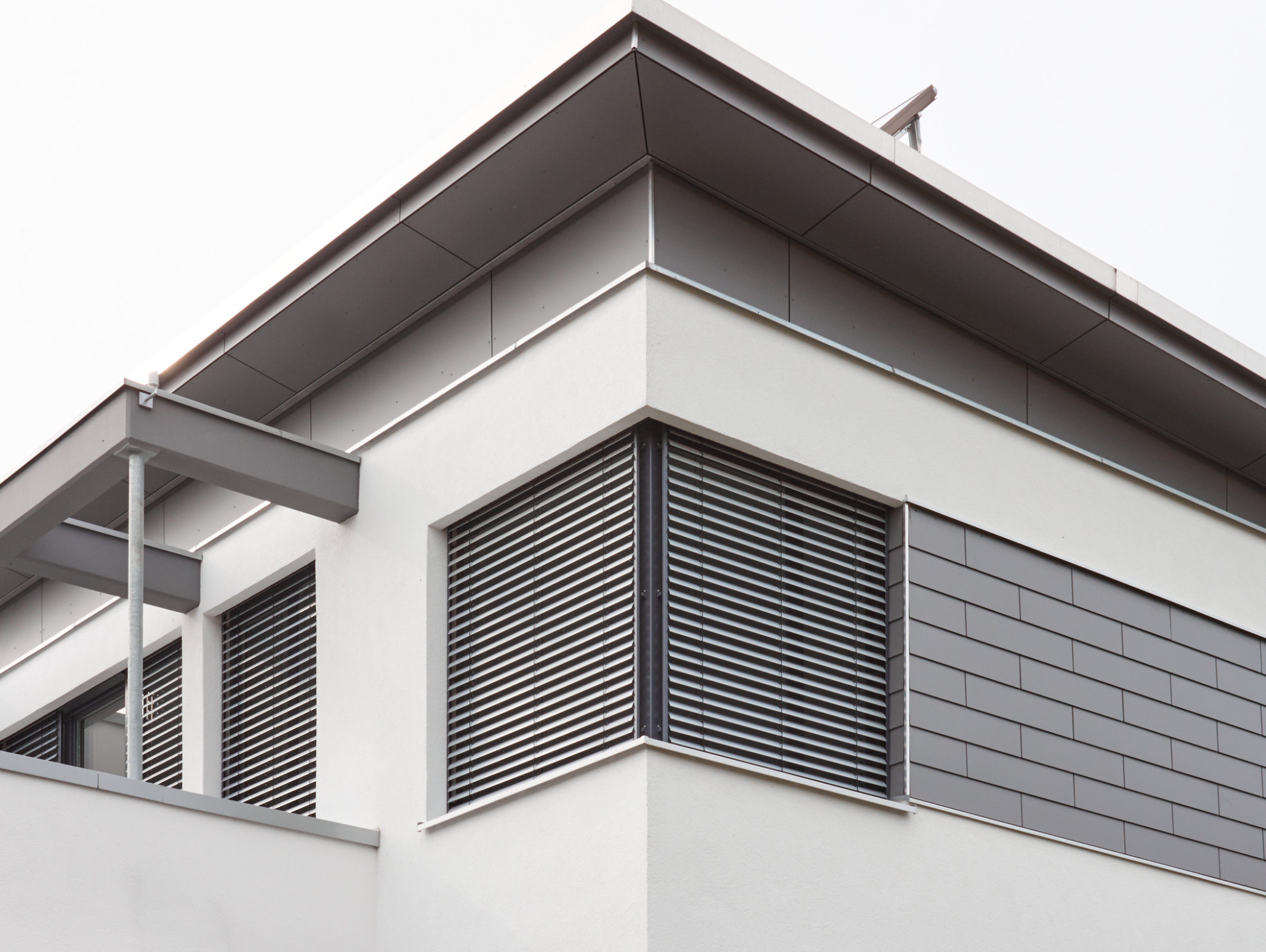 Pultdachverkleidung mit Fundermax Exterior 0075 grau